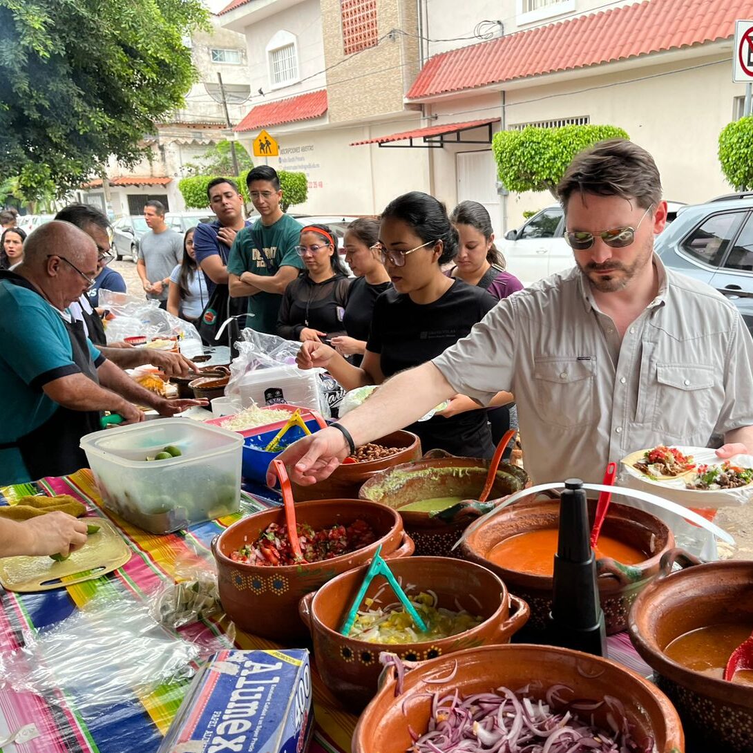 Guest chooses from the may options of homemade salsas and toppings for their asada and aldilla tacos