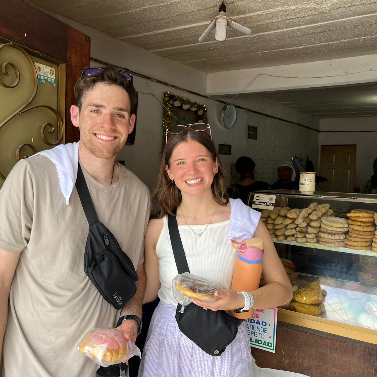 Guests holding their selection from a local bakery in Puerto Vallarta